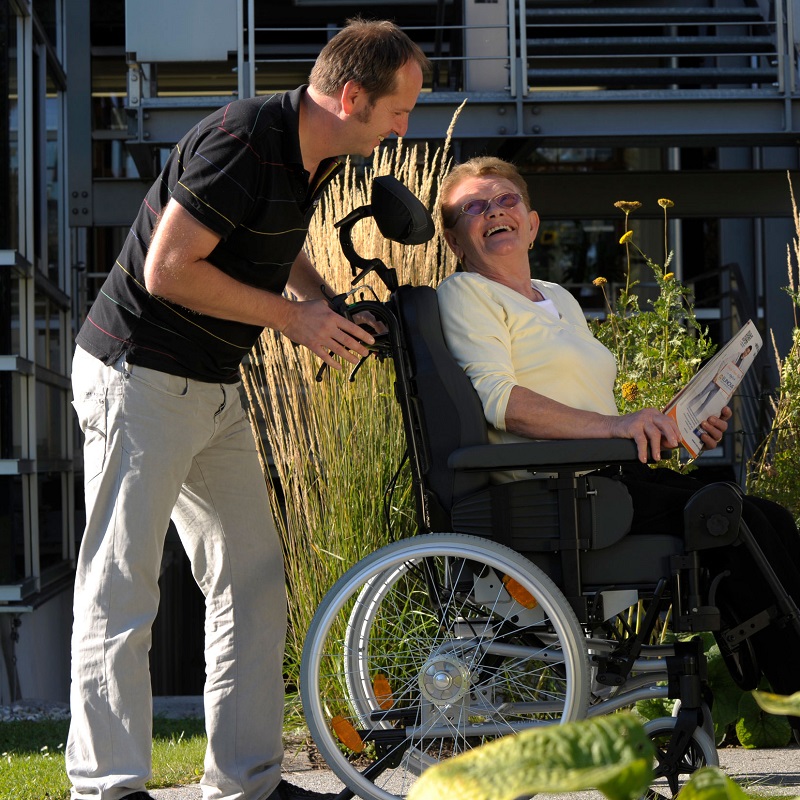 Adjustable seat positioning wheelchair for postural support